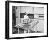 Man Taking Bread Loaves from Oven-Philip Gendreau-Framed Photographic Print