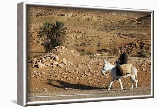 Man traveling on a donkey, Douirette, Tataouine, Tunisia-Godong-Framed Photographic Print
