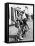 Man Trying to Balance an Exuberant Woman on a Bicycle-null-Framed Stretched Canvas