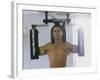 Man Using Exercise Machine-null-Framed Photographic Print