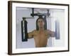 Man Using Exercise Machine-null-Framed Photographic Print
