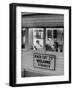 Man Waiting in a Barber Shop For a Haircut-Francis Miller-Framed Photographic Print