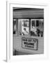 Man Waiting in a Barber Shop For a Haircut-Francis Miller-Framed Photographic Print