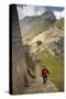 Man Walking Down Stone Steps of Machu Picchu, Peru-Merrill Images-Stretched Canvas