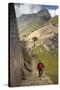 Man Walking Down Stone Steps of Machu Picchu, Peru-Merrill Images-Stretched Canvas