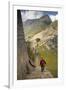 Man Walking Down Stone Steps of Machu Picchu, Peru-Merrill Images-Framed Premium Photographic Print