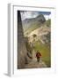 Man Walking Down Stone Steps of Machu Picchu, Peru-Merrill Images-Framed Photographic Print