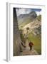 Man Walking Down Stone Steps of Machu Picchu, Peru-Merrill Images-Framed Photographic Print