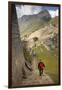 Man Walking Down Stone Steps of Machu Picchu, Peru-Merrill Images-Framed Photographic Print