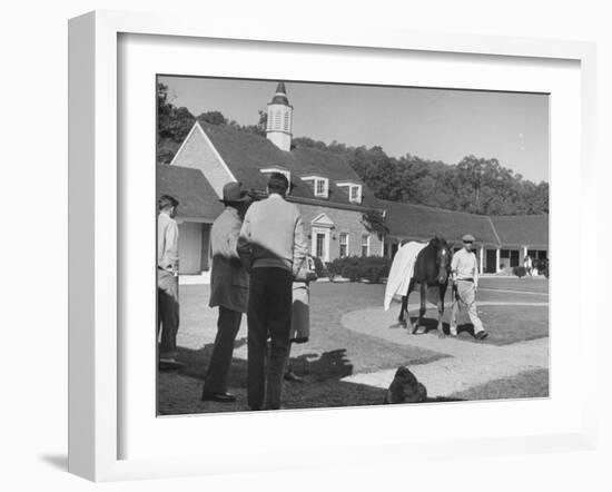 Man Walking Horse in Front of Stables at Rolling Rock Fox Hunt-null-Framed Photographic Print