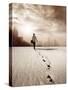 Man Walking in a Desert towards a City-olly2-Stretched Canvas