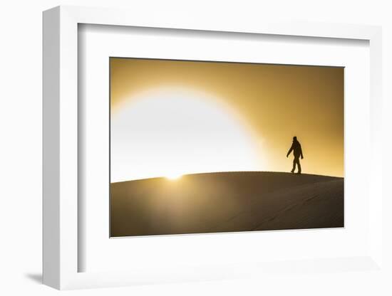 Man walking in backlight on a sand dune, Tenere desert, Niger, West Africa, Africa-Michael Runkel-Framed Photographic Print