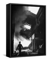 Man Walking in the Smokey Steel Mill-Nat Farbman-Framed Stretched Canvas