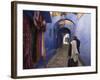 Man Walking Through Pastel Coloured Streets of Chefchaouen, Morocco, North Africa, Africa-Christian Kober-Framed Photographic Print