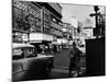 Man Walking Through Time Square-Peter Stackpole-Mounted Photographic Print