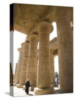 Man Walks Underneath the Giant Columns of the Hypostyle Hall in the Ramesseum, Luxor-Julian Love-Stretched Canvas