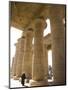 Man Walks Underneath the Giant Columns of the Hypostyle Hall in the Ramesseum, Luxor-Julian Love-Mounted Photographic Print