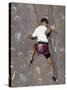 Man Wall Climbing Indoors with Equipment-null-Stretched Canvas