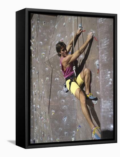 Man Wall Climbing Indoors-null-Framed Stretched Canvas