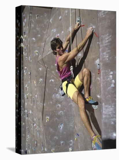 Man Wall Climbing Indoors-null-Stretched Canvas