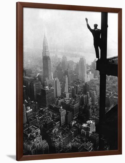 Man Waving from Empire State Building Construction Site-null-Framed Photographic Print