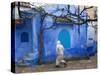 Man Wearing a Djellaba on the Street, Chefchaouen, Morocco-Peter Adams-Stretched Canvas