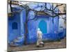 Man Wearing a Djellaba on the Street, Chefchaouen, Morocco-Peter Adams-Mounted Photographic Print