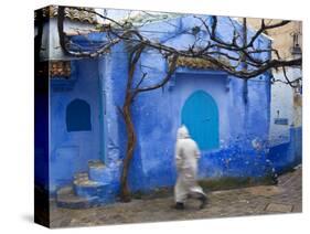 Man Wearing a Djellaba on the Street, Chefchaouen, Morocco-Peter Adams-Stretched Canvas