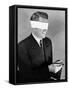 Man Wearing Blindfold Holding Money (B&W)-Hulton Archive-Framed Stretched Canvas