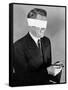 Man Wearing Blindfold Holding Money (B&W)-Hulton Archive-Framed Stretched Canvas