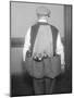 Man Wearing Coat Holding Bottles-null-Mounted Photographic Print