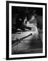 Man Welding Pieces of Metal Together-Allan Grant-Framed Photographic Print