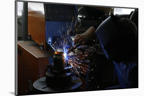 Man Welding Workpiece, Workshop, Flying Sparks-Fact-Mounted Photographic Print
