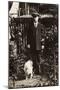 Man with a Dog in a Garden-null-Mounted Photographic Print