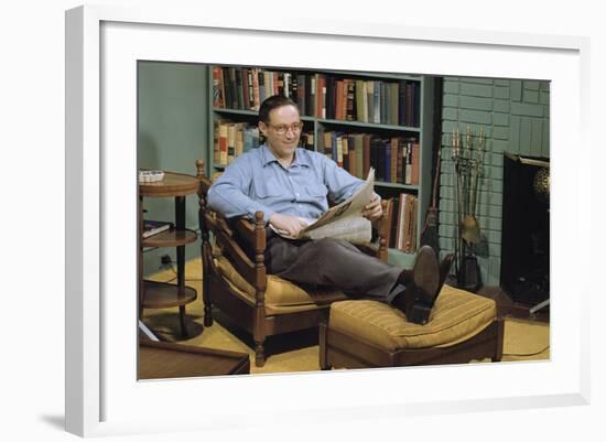 Man with a Newspaper at Home-William P. Gottlieb-Framed Photographic Print