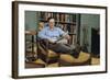 Man with a Newspaper at Home-William P. Gottlieb-Framed Photographic Print