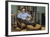 Man with a Newspaper at Home-William P. Gottlieb-Framed Photographic Print