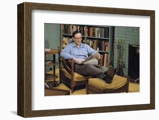 Man with a Newspaper at Home-William P. Gottlieb-Framed Photographic Print