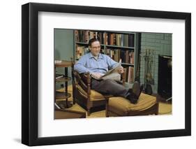 Man with a Newspaper at Home-William P. Gottlieb-Framed Photographic Print