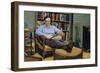Man with a Newspaper at Home-William P. Gottlieb-Framed Photographic Print