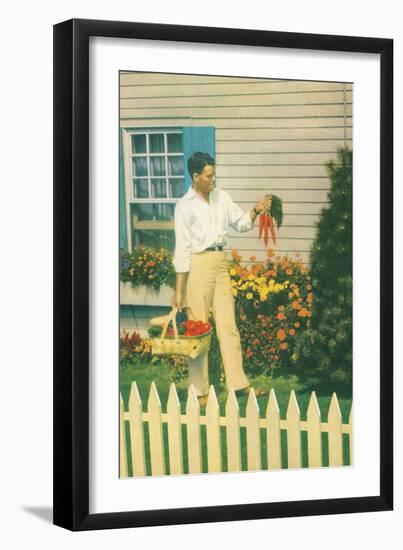 Man with Carrots in Yard-null-Framed Art Print