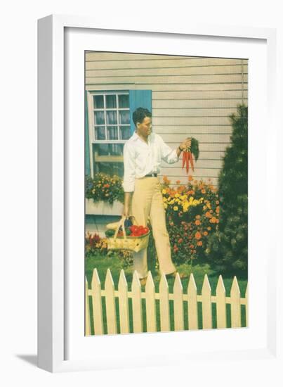 Man with Carrots in Yard-null-Framed Art Print