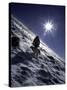 Man with Dog Climbing Arapahoe Peak in Strong Wind and Snow, Colorado-Michael Brown-Stretched Canvas