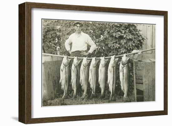 Man with Fish Hanging on Pole-null-Framed Art Print