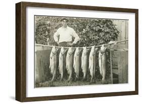 Man with Fish Hanging on Pole-null-Framed Art Print