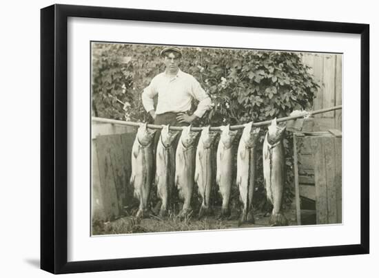 Man with Fish Hanging on Pole-null-Framed Art Print