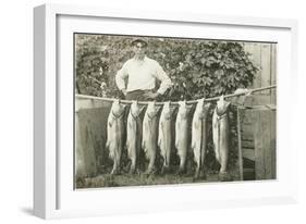 Man with Fish Hanging on Pole-null-Framed Art Print