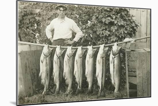 Man with Fish Hanging on Pole-null-Mounted Art Print