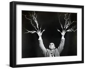 Man with Lightning Shooting from Fingers (B&W)-Hulton Archive-Framed Photographic Print