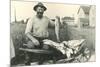 Man with Load of Fish-null-Mounted Art Print